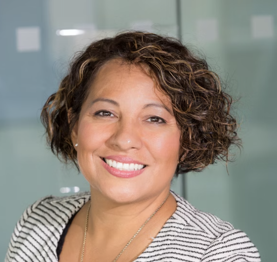 Smiling woman with curly hair